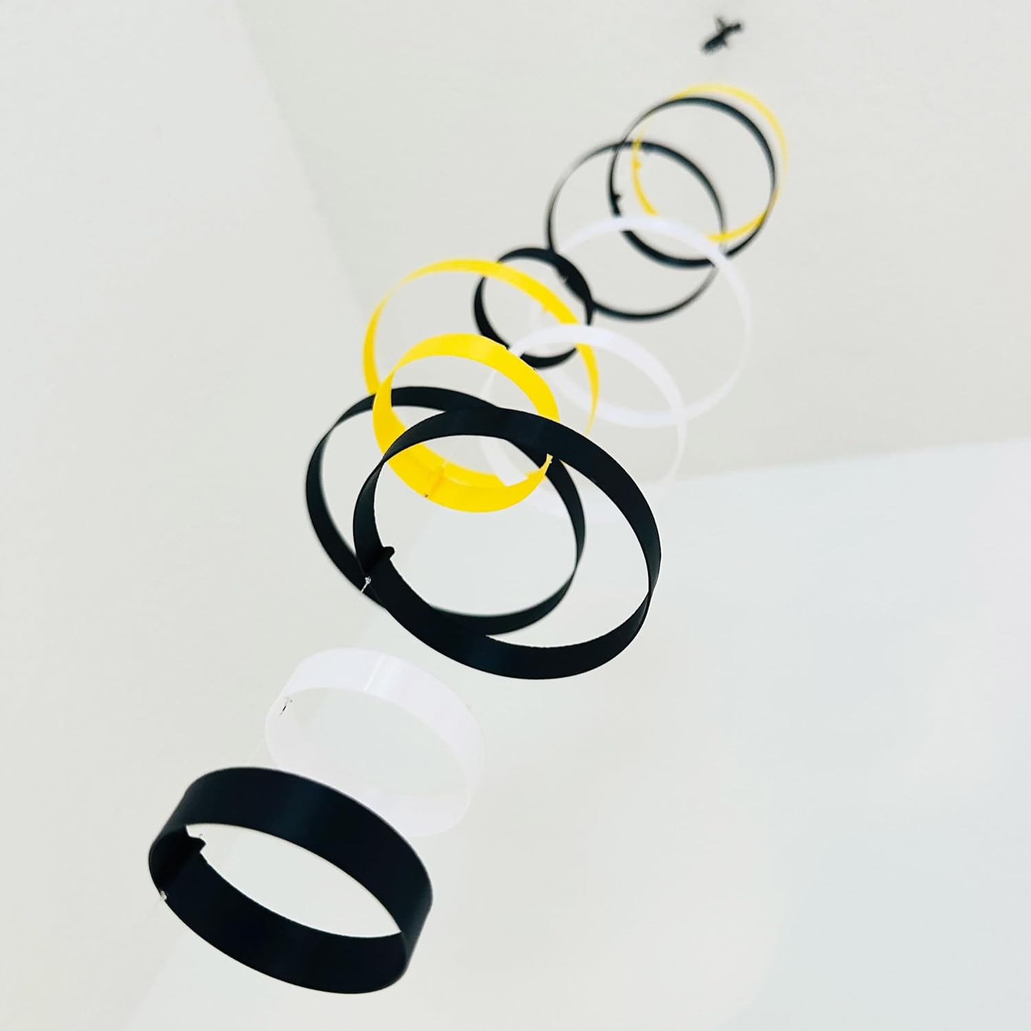 Whirlwind Kinetic Mobile with 12 Rings in Black Yellow and White
