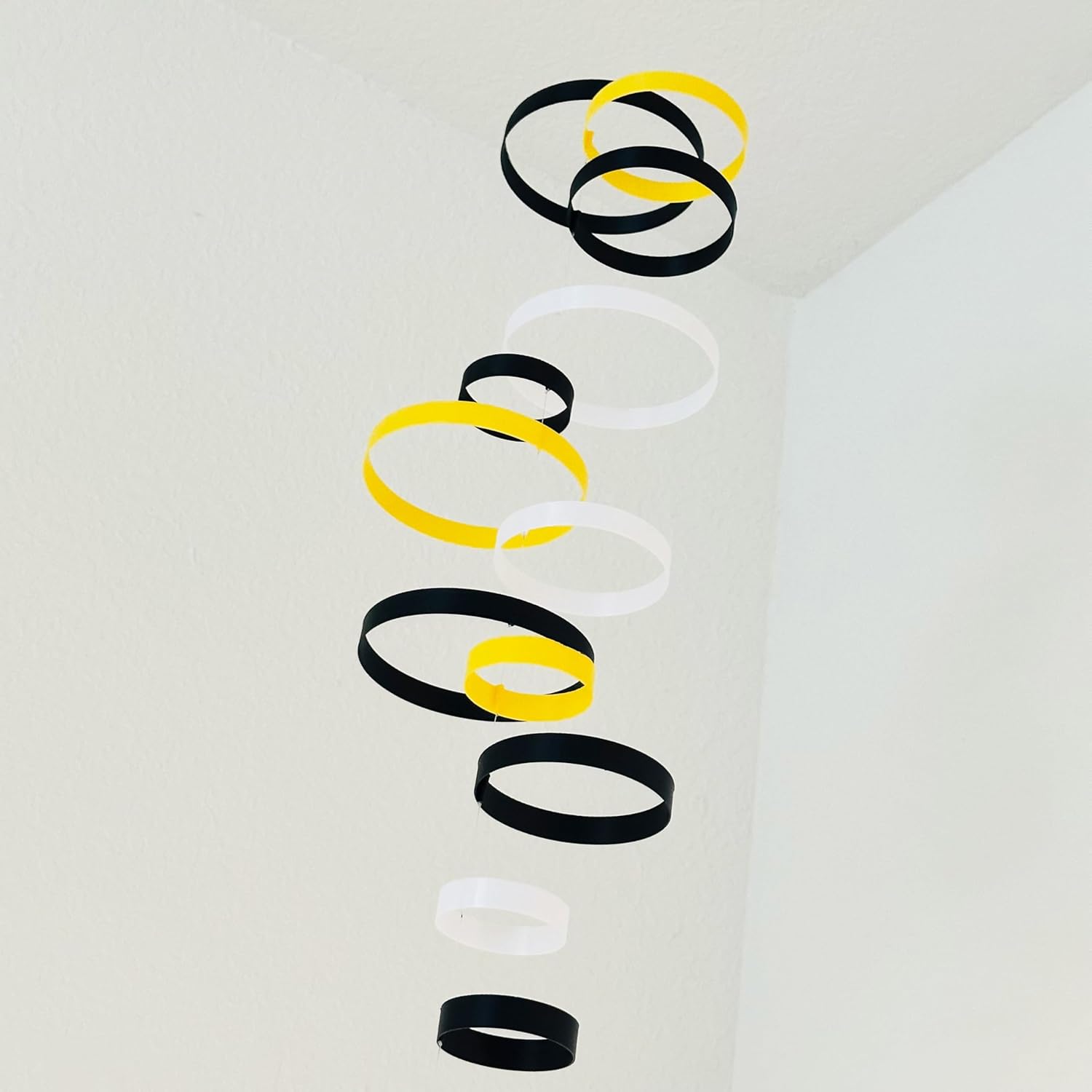 Whirlwind Kinetic Mobile with 12 Rings in Black Yellow and White